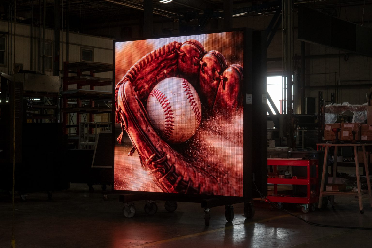 6mm full color LED sign showing a detailed baseball glove image during factory testing